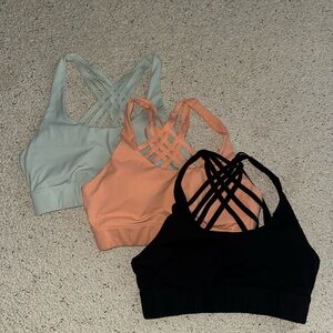 Zyia strappy Women's Sports Bra Trio - Black, Peach, Mint